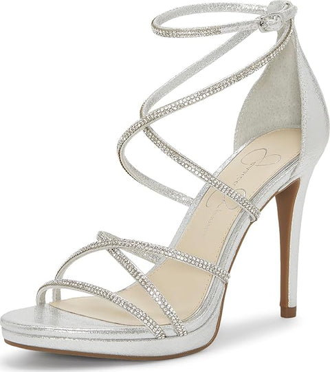 Silver strappy high-heeled shoe on a white background