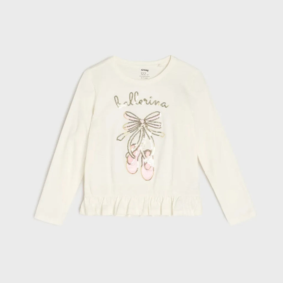 An off-white long-sleeve top for girls, featuring a ruffled hem and a sequined graphic of ballet shoes with the word 'ballerina' written above. The brand 'mimi' is visible on the inner neck label.