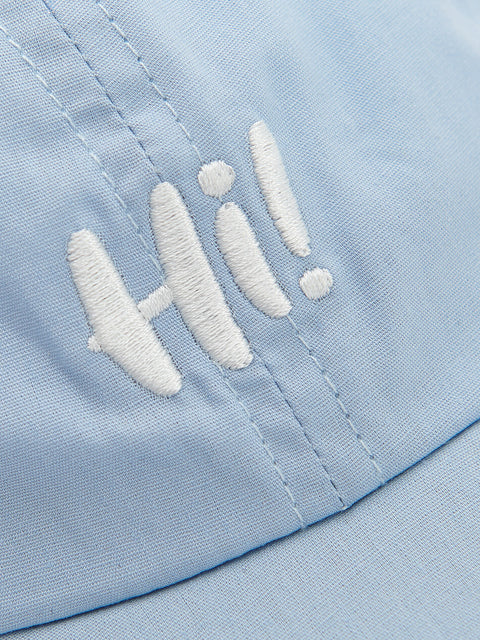 Light blue cap with white 'Hi!' embroidery on a light blue background