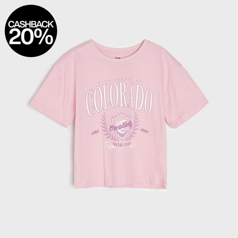 Pink t-shirt with 'Colorado' text on a white background