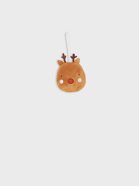 Plush reindeer ornament on a white background