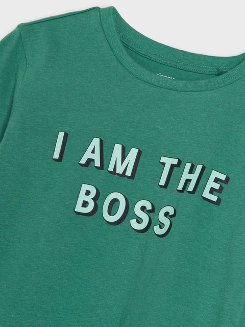 Green t-shirt with 'I AM THE BOSS' text on a white background