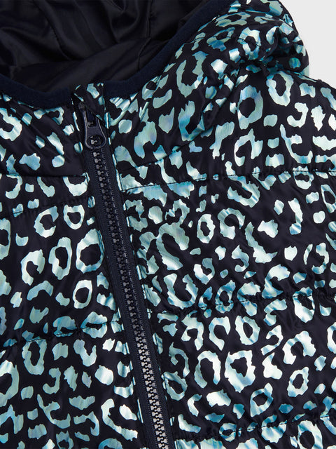 Close-up of a jacket with a blue and white leopard print pattern on a black background.