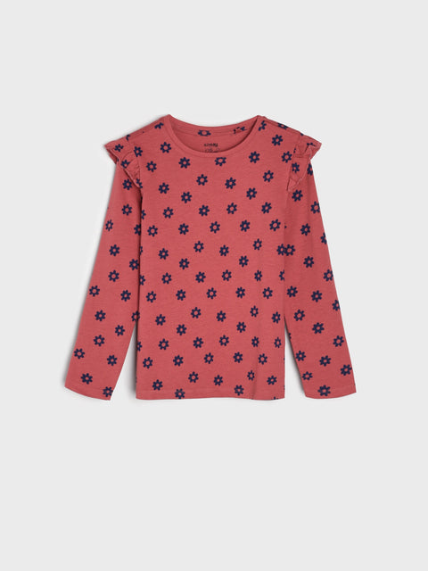 Pink long-sleeve shirt with blue floral pattern on a white background