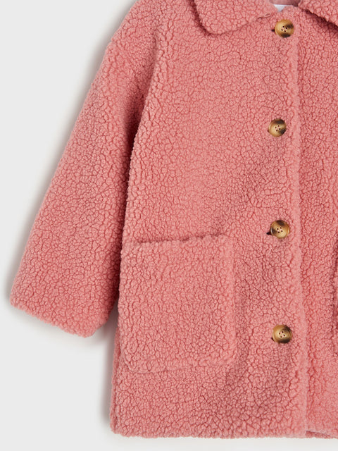 Pink fleece jacket with gold buttons on a white background