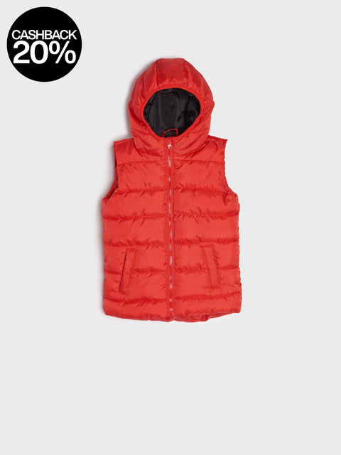 Red puffer vest on a light gray background