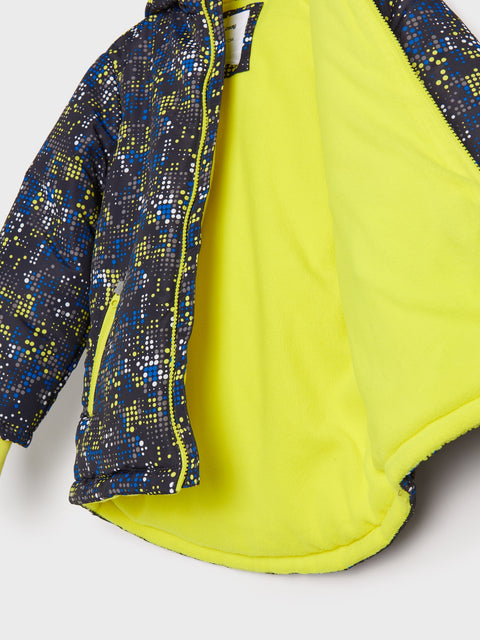 Close-up of a jacket with blue and yellow pattern on a white background