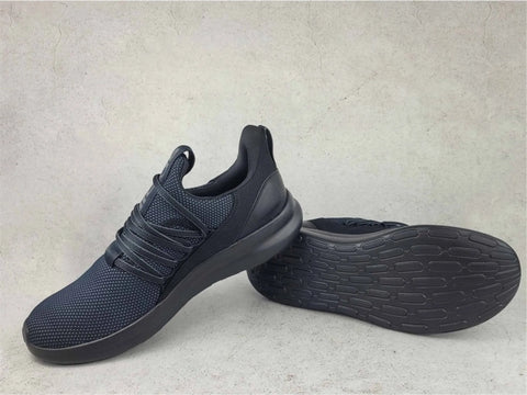 Black athletic shoes on a light gray background
