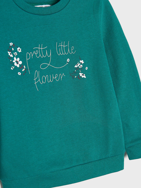 Teal sweatshirt with 'pretty little flower' text and floral designs on a white background