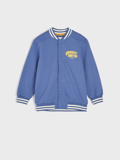 Blue varsity jacket with yellow text on a light gray background