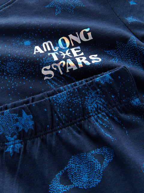 Navy blue fabric with 'Among the Stars' text and star patterns