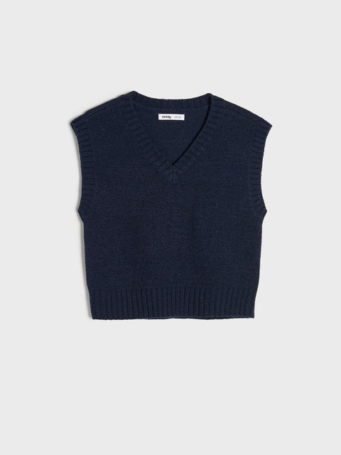 Navy blue knitted vest on a light gray background