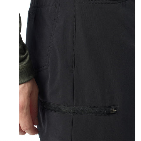 Close-up of black pants with a focus on the fabric texture and stitching details.