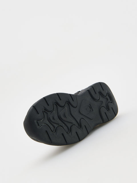 Black sole of a shoe on a white background