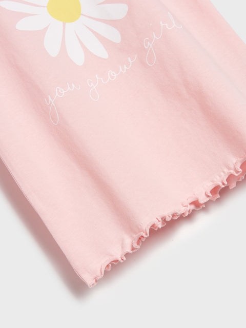 Pink fabric with a white daisy and text on a light gray background