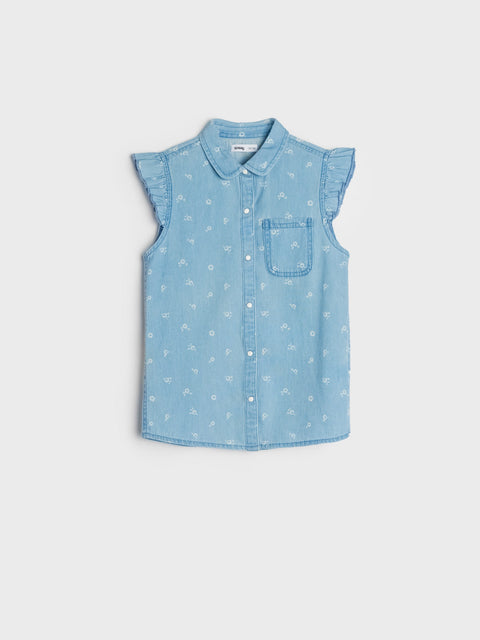 Light blue sleeveless denim shirt with subtle pattern on a white background