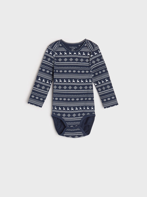 Navy blue baby onesie with white pattern on a light gray background