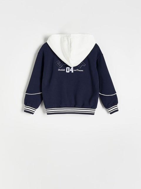 Navy blue hoodie with white hood on a light gray background