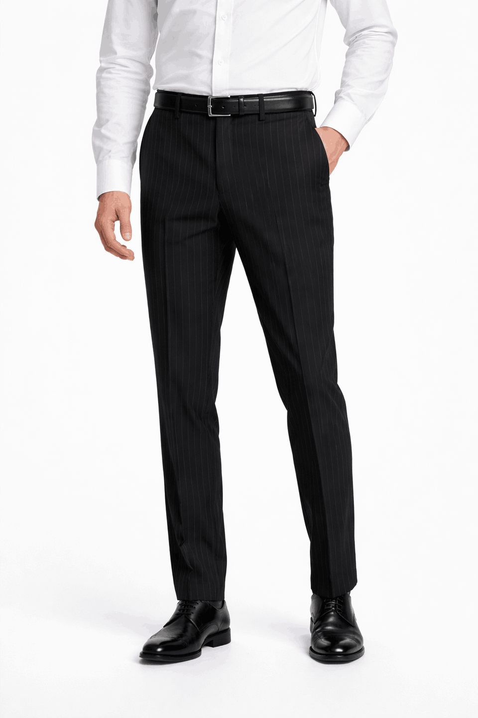Person wearing a white dress shirt, black pants, and black shoes on a white background
