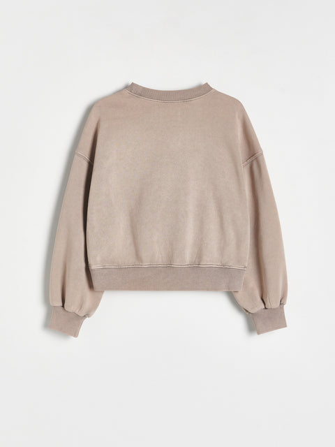 Beige sweatshirt on a white background