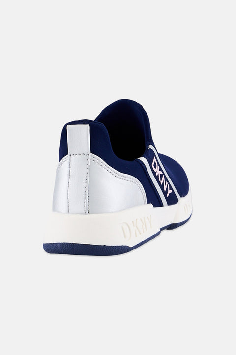 Navy and silver sneaker with 'DKNY' branding on a white background