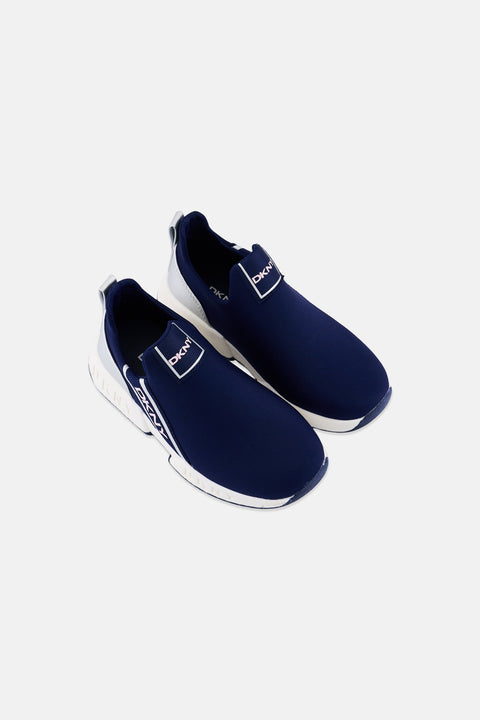 Pair of navy slip-on shoes with a brand logo on a white background
