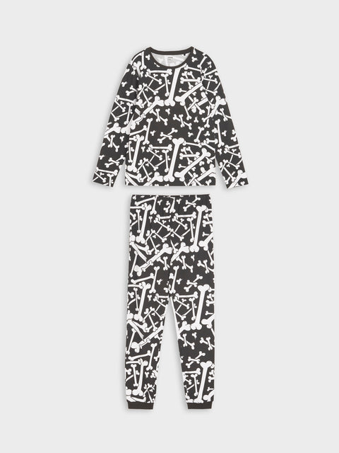 Black and white patterned pajama set on a white background