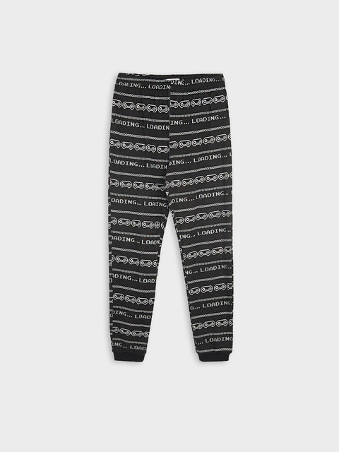 Black jogger pants with white text pattern on a white background