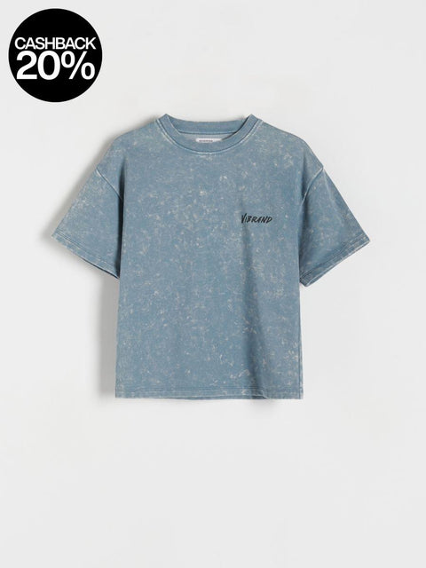 Blue t-shirt with a brand logo on a light gray background