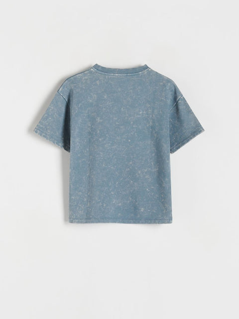 Blue t-shirt on a light gray background