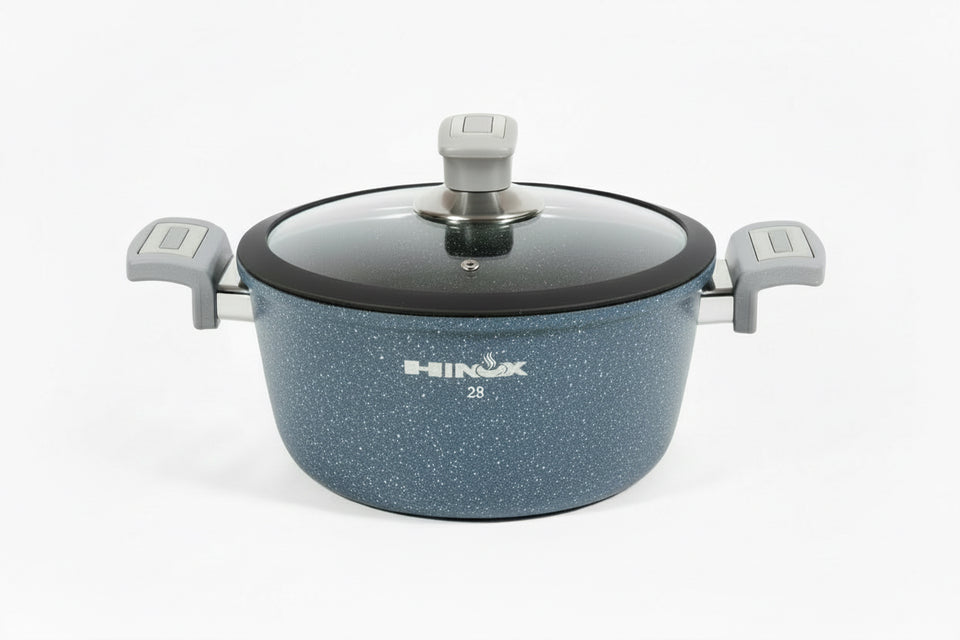 Blue speckled cookware set with a lid on a white background