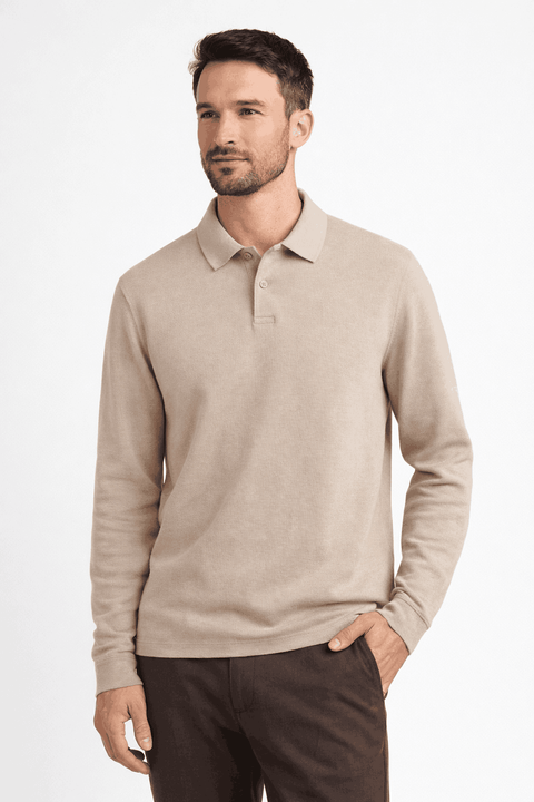 Man wearing a beige sweater on a white background