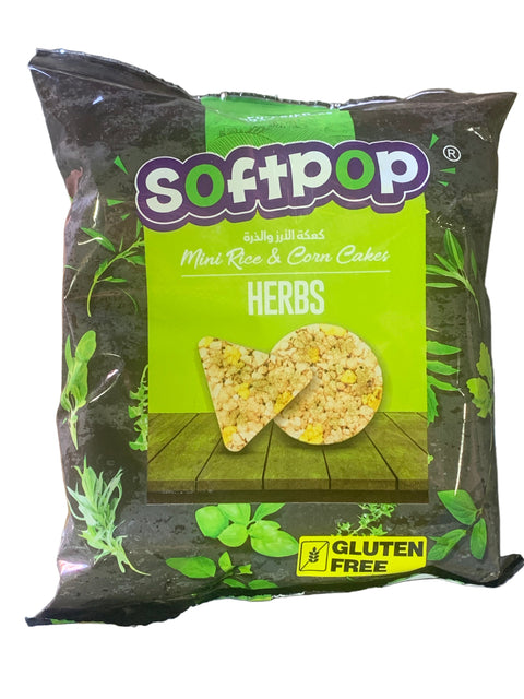 Packaged snack with 'softpop' branding on a dark surface