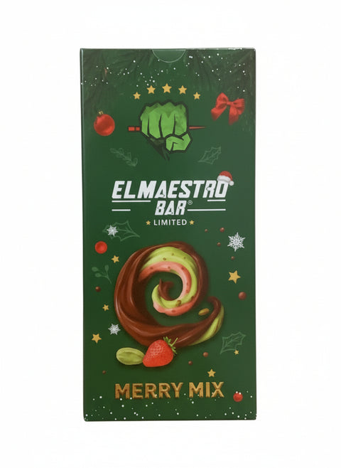 Hand holding a green box of Elmaestro Bar Merry Mix against a neutral background