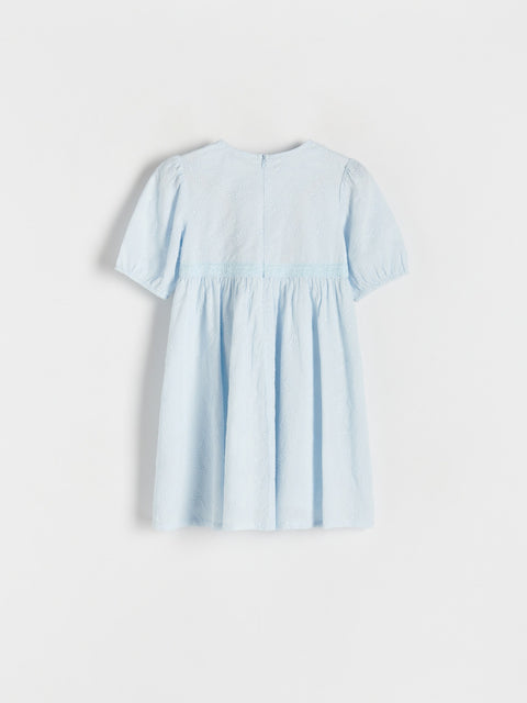 Light blue dress on a white background