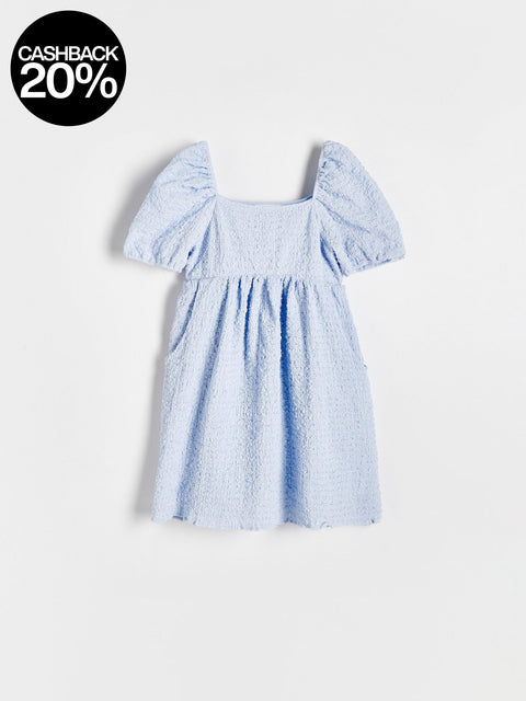 Light blue dress with puff sleeves on a white background