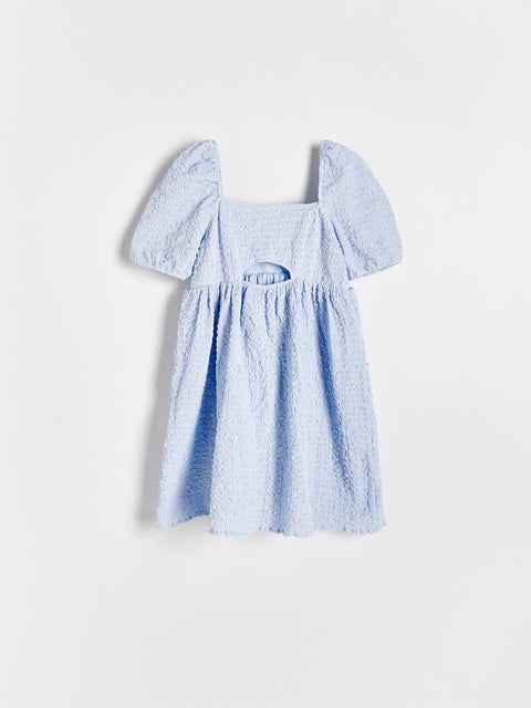 Light blue checkered dress on a white background