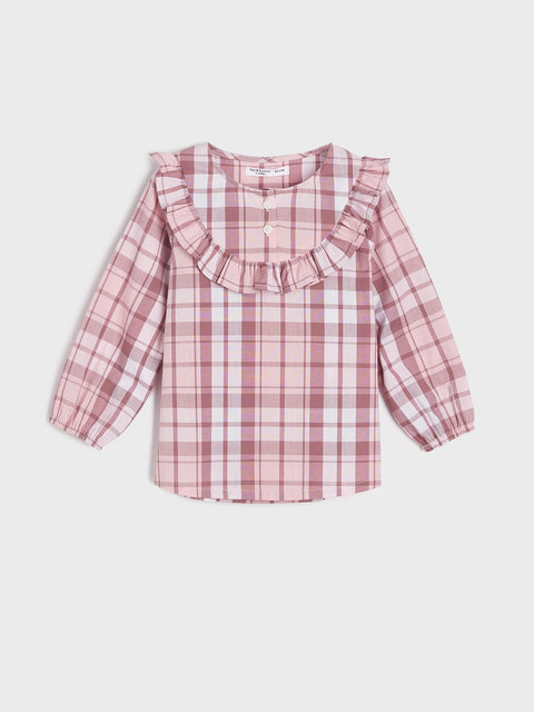 Pink and white checkered blouse with ruffled details on a light gray background