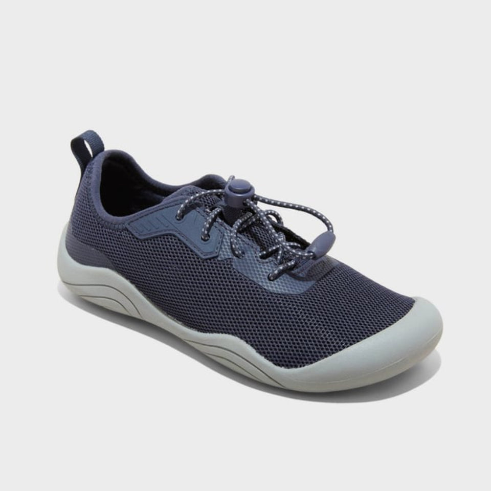Navy blue athletic shoe on a light gray background