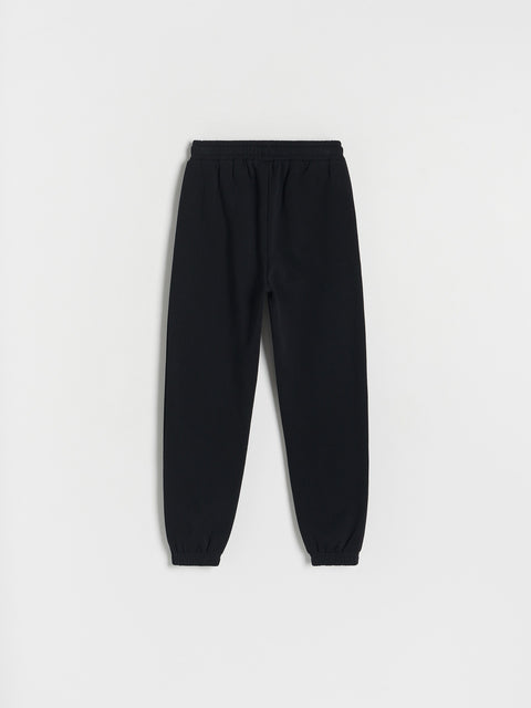 Black sweatpants on a white background