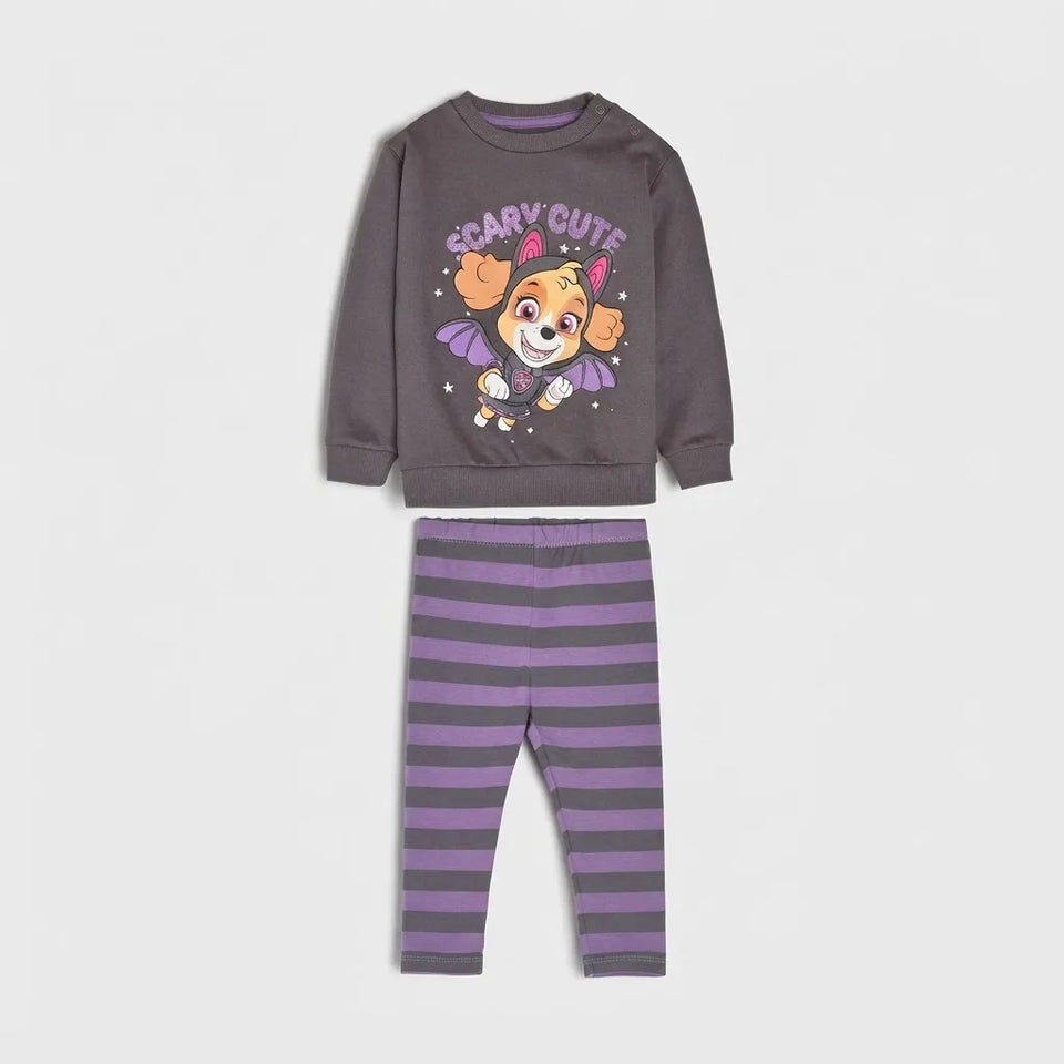 A children's two-piece pajama set featuring a dark gray sweatshirt with a 'Scary Cute' cartoon dog graphic and matching purple and dark gray striped leggings, shown on a light gray background.