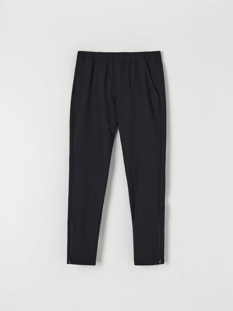 Black pants on a light gray background