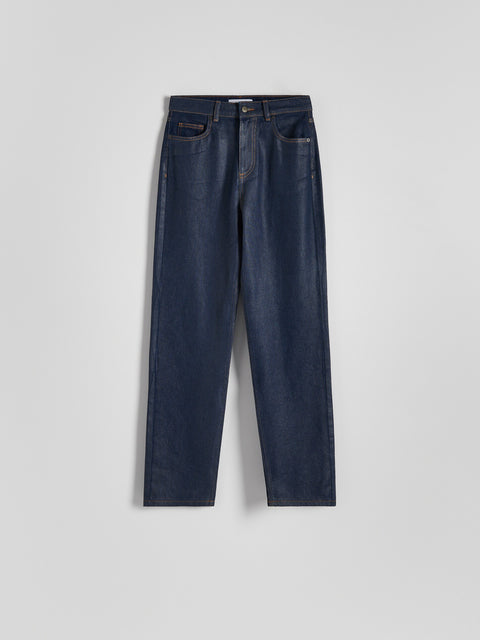Pair of dark blue jeans on a light gray background