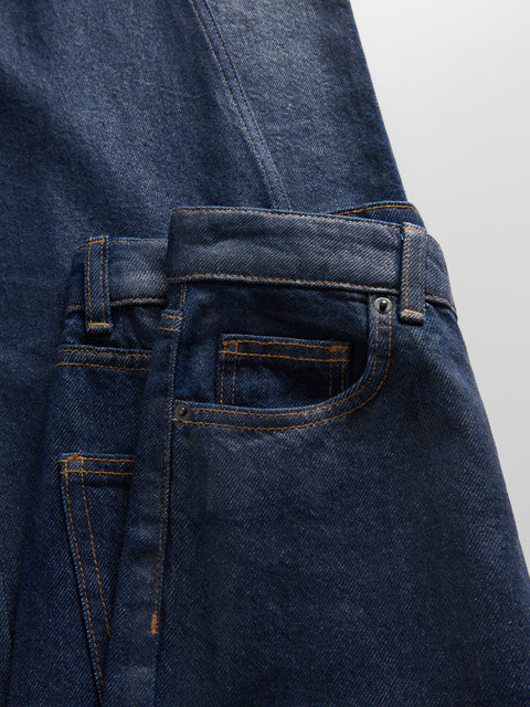 Close-up of a blue denim apron on a white background