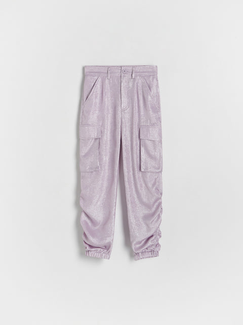 Purple cargo pants on a white background