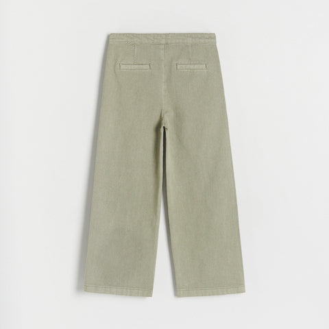 Light green pants on a white background