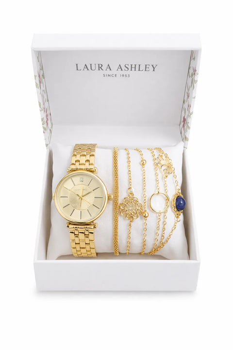 Gold watch and jewelry set in a Laura Ashley box on a white background