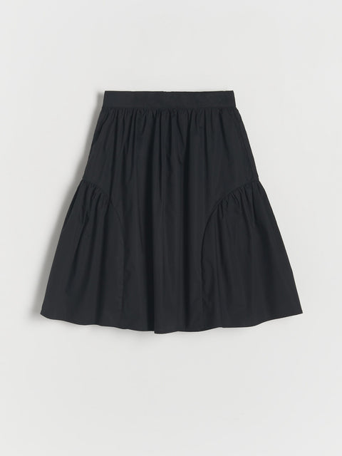 Black skirt on a light gray background