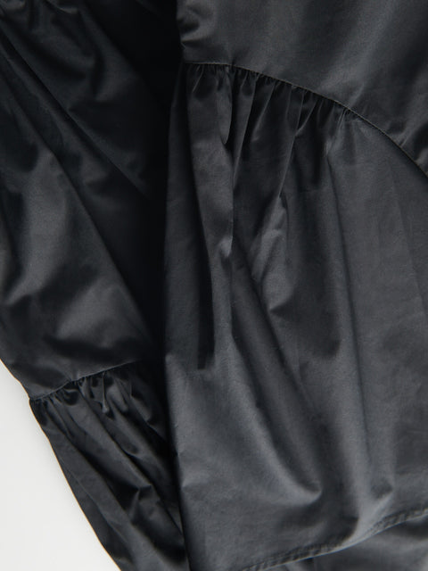 Close-up of black fabric with a textured surface