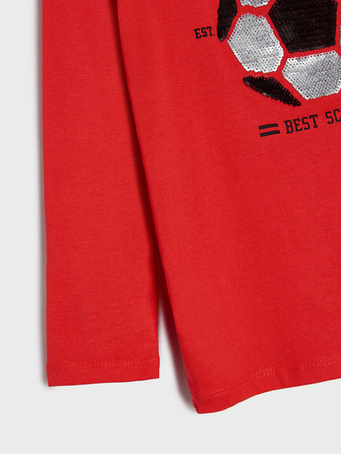 Red long-sleeve shirt with a soccer ball design on a white background
